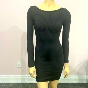 Never worn backless mini dress with a tie back bow size small